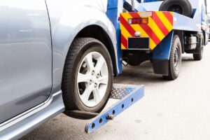 truck towing cars