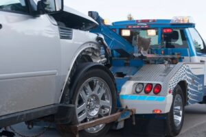 truck towing cars