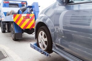 truck towing cars